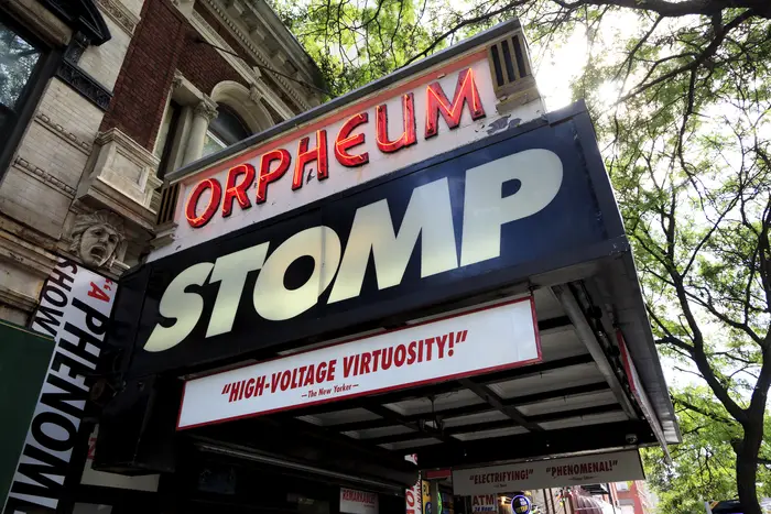 Images of the off-Broadway show "Stomp" and its participants dancing